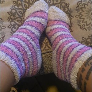 Pink and white fuzzy socks